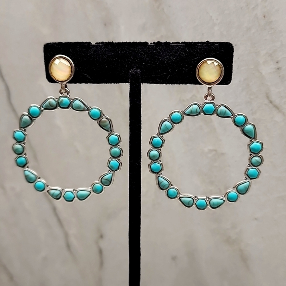 Lucky Brand post earrings with turquoise color howlite and set with moonstone.